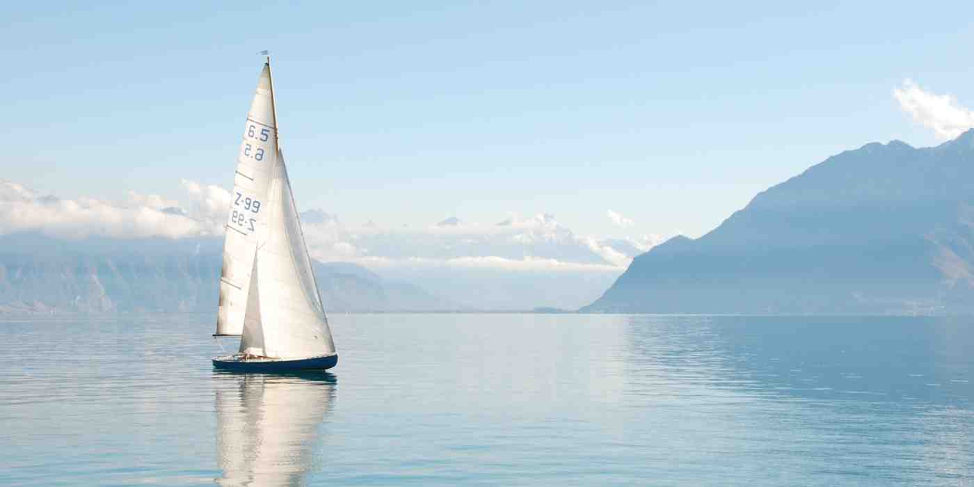 Sailboat on calm seas to depict recovery from addiction through counselling therapy